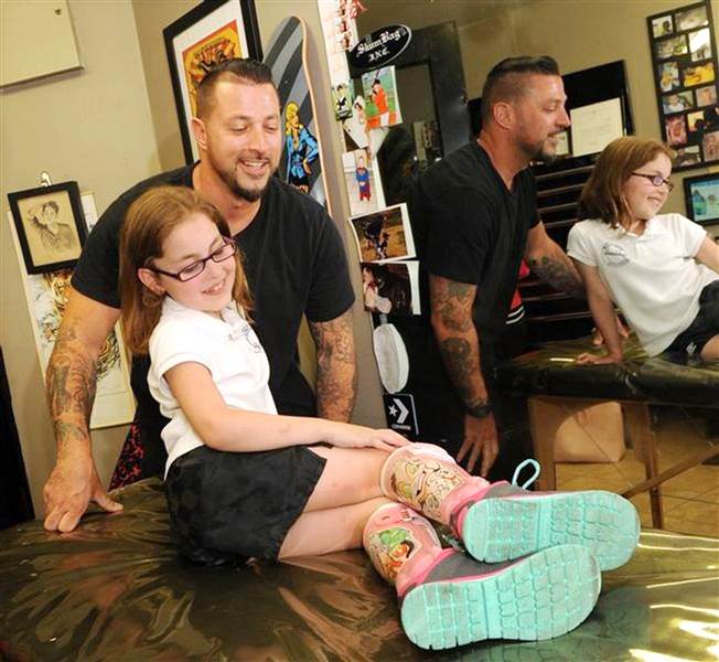 Tattoo Artist Helps a Young Girl Add Art to Her Leg Braces 