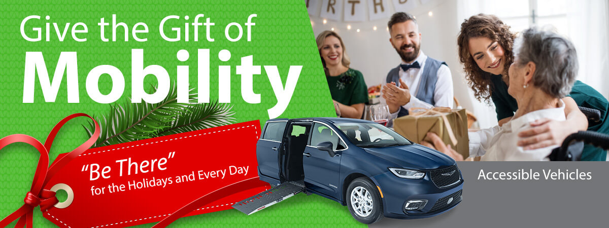 Holiday-themed advertisement showing a family with a gift and an accessible vehicle with a ramp. Text reads: Give the Gift of Mobility. Be There for the Holidays and Every Day.