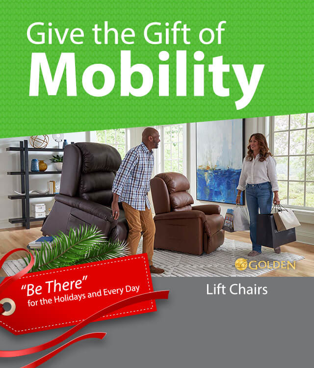 A man sits in a brown lift chair while a woman stands nearby holding shopping bags. Text reads, Give the Gift of Mobility, promoting Golden lift chairs.